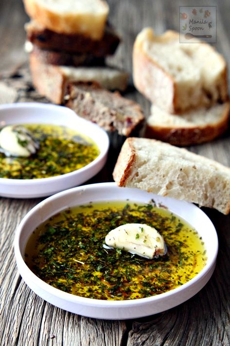 Restaurant-style sauce with olive oil, Italian herbs and balsamic vinegar perfect for dipping your favorite crusty bread. Mix it up with your favorite herbs and add a spicy kick to create your own flavor blend. | manilaspoon.com Italian Bread Dipping Oil, Recipes With Balsamic Vinegar, Recipes With Balsamic, Bread Dipping Oil, Bread Dipping, Italian Night, Italian Dinner Party, Dipping Oil, Italian Party