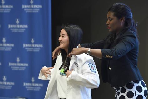 Since 2014, the Johns Hopkins School of Nursing has held white coat ceremonies to mark the entrance of nursing students into the health profession Nursing Acceptance Pictures, White Coats, School Of Nursing, White Coat Ceremony, Becoming A Doctor, Baltimore City, Nursing Career, Nurse Hat, Picture Letters