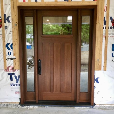 *NEW CONSTRUCTION* features handsome #handmade #custommade #mahogany #AmberwoodDoors Craftsman style #door system; dual clear glass; Roasted stain; New Country Mortise lockset in Flat Black. Call or come into Amberwood's outstanding #showroom today and discover your dream #doors 416-213-8007 #Amberwood proudly ships #worldwide - Call today for shipping details! 1-800-861-3591 #IHaveThisThingWithDoors #DoorsOfToronto #DoorsOfDistinction #DoorsOfTheWorld #CurbAppeal Front Door Shaker Style, Front Door With 2 Sidelights, Front Entry Doors With Sidelights, Main Door Grill Design, Main Door Grill, Door Grill Design, Craftsman Style Door, Craftsman Exterior Door, Exterior Doors With Sidelights