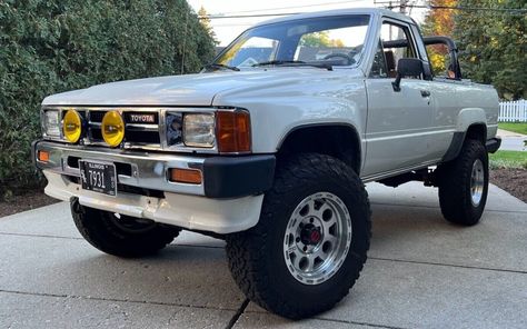 This 1986 Toyota 4Runner SR5 has a few modern enhancements plus it's a rare automatic. Could you see yourself going offroad in this 4WD? #4Runner, #4WD, #SR5, #Toyota 1988 Toyota 4runner, 1st Gen 4runner, Toyota Runner, Hilux 4x4, 4runner Sr5, Toyota 4runner Sr5, Best Barns, Toyota Pickup, Mitsubishi L200