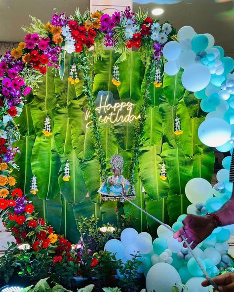 Krishna Janmashtami Decoration Ideas, Krishna Janmashtami Decoration, Janmashtami Celebration, Janmashtami Decoration, Faux Grass, Krishna Janmashtami, Colourful Balloons, Paper Fans, Soft Carpet