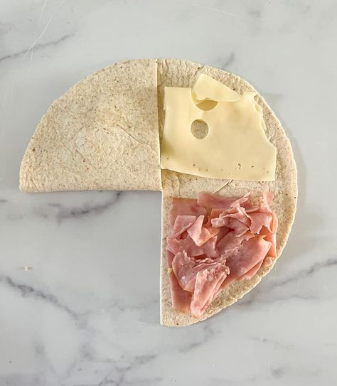 Ham Cheese Quesadilla, Easy Lunch Meat Wraps, Folded Wrap Combinations, Folded Sandwich Wrap, Ham Egg And Cheese Tortilla Wrap, Folded Wrap Sandwich Ideas, Folded Wraps Ideas, Ham And Turkey Lunch Meat Ideas, Ham And Cheese Burritos