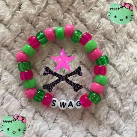 Purple Kandi Bracelet, Scene Kandi Singles, Scenecore Bracelets, Kandi Singles Ideas Emo, Scene Bracelets Ideas, Themed Clay Bead Bracelets, Scene Kandi Bracelets, Kandi Single Ideas, Bracelet Ideas Pony Beads