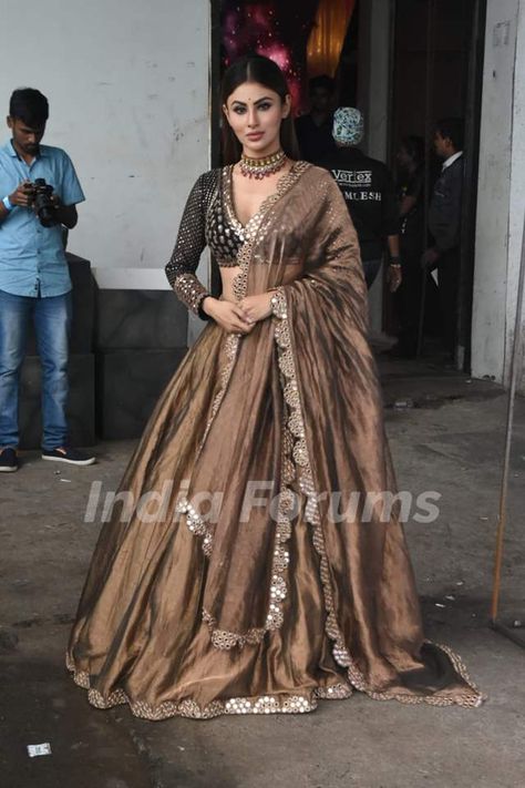 Mouni Roy Lehenga Outfit, Lehnga Colour Ideas, Tissue Lehnga Design, Tissue Chaniya Choli, Tissue Cloth Dresses, Mouni Roy Lehenga, Non Bridal Lehenga Outfit, Wine Colour Lehenga Color Combos, Brown Indian Outfit