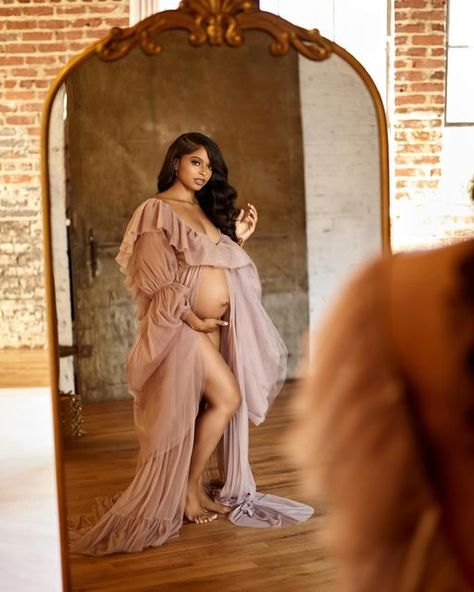 Mirror, mirror on the wall, who is answering 2024’s motherhood call? 👀 If it’s you, let’s capture the magic of this incredible journey together. 🫶🏾 From ethereal gowns to gorgeous natural glam, our maternity sessions are a celebration of the beauty and anticipation of motherhood. 🤰✨ Maternity Pictures With Mirror, Maternity Shoot Nails Ideas, Mirror Maternity Pictures, Glam Maternity Shoot, Editorial Maternity, Indoor Maternity Photos, Ethereal Gowns, Studio Maternity Photos, Family Maternity Photos