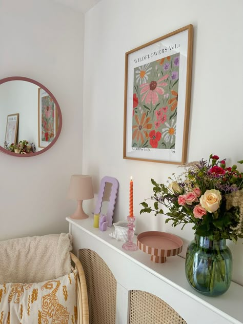 [Ad] Making Use Of Cute Accessories Is The Easiest Way To Upgrade Your Home. IM Obsessed With Colourful Home Interiors With A Vintage Twist, So When Decorating This Small Corner Of My Bedroom, I Focused On Florals, Pastel Colours And Interesting Shapes, Paired With Natural Materials Like Rattan Cane. Items Featured: Rattan Came Sideboard (Diy) Round Pink Mirror (Dunelm) Floral Wall Art (Ellie Mae Designs) Rattan Chair (Ikea) Boucle Throw #colourfullivingroomdecorsmallspaces Colourful Decor Aesthetic, Pastel Cushions Living Rooms, Colourful Accessories Home, Small Colourful Bedroom Ideas, Simple Colourful Bedroom, Bedroom Decor Pastel, Small Colourful Bedroom, Floral Vintage Room, Colourful Home Aesthetic