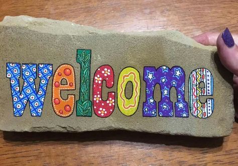 Welcome painted rock Welcome Rocks Painted, Rock Painting Ideas Welcome, Welcome Rock Painting Ideas, Welcome Rock Painting, Welcome Painted Rocks Front Doors, Painted Rock Welcome Sign, Names Painted On Rocks, Names On Rocks Painted Stones, Painted Pavers