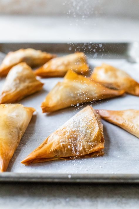 This easy Apple Turnover recipe is filled with apples, cinnamon, and golden raisins and made with a phyllo dough crust. It’s the perfect light fall dessert or breakfast! #apples #dessert #fall #weightwatchersdessert Light Fall Desserts, Sweet Potato Puffs Recipe, Sweet Potato Puffs, Apple Turnover Recipe, Apple Turnover, Vegan Apps, Potato Puffs, Lamb Skewers, Turnover Recipes