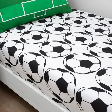 * Includes 2 x fitted sheets * Football and plain grey designs * Easy-care polycotton material * Machine washable One sheet features an all over football design while the other is a plain grey. These sheets are designed to coordinate with the Football duvet cover set, a perfect match. Easy to care for, these sheets have been crafted from a soft polycotton material that can be fully machine washed.This product is OEKO-TEX® MADE IN GREEN certified, meaning it was produced in OEKO-TEX® STeP certified factories - verifying environmental, social, and chemical standards in the facility. It has also been certified to OEKO-TEX® STANDARD 100, the original safety standard for everyday confidence. To offer full visibility, the production stages throughout the supply chain can be traced. Football Room, Football Rooms, Football Bedroom, Black And White Football, Football Bedding, Cot Bedding, Football Design, Gray Design