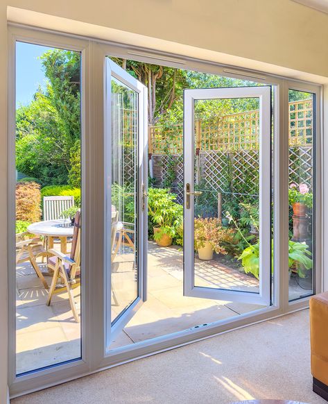 French patio doors with side windows can transform your living space with more natural light.. Patio With French Doors, Large French Doors Patio, Backyard French Doors, French Sliding Doors Exterior, Doors With Side Windows, French Doors With Side Windows, Patio Doors French, Outdoor French Doors, French Doors Patio Exterior