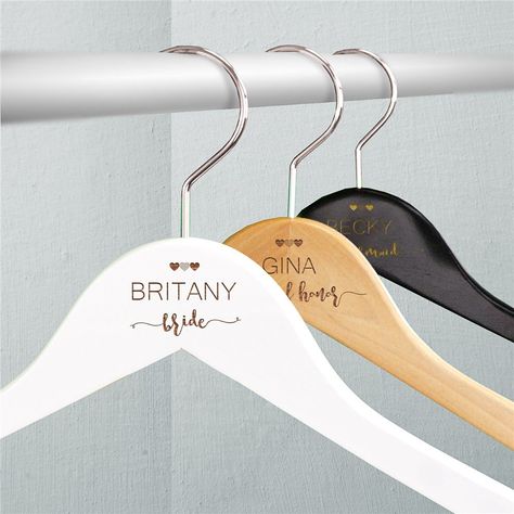 Your Bridal Party will be thrilled to display their dresses next to yours with our Engraved Wedding Party Hangers. Check out our Personalized Hangers. They are sure a special #gift for your #bridalparty on your big day! Bridal Suite Ideas Wedding Day, Bridesmaid Hangers Diy, Bridal Suite Ideas, Diy Wedding Hangers, Wedding Party Hangers, Groomsman Ideas, Bridesmaid Dress Hangers, Bridal Gift Ideas, Engraved Hangers