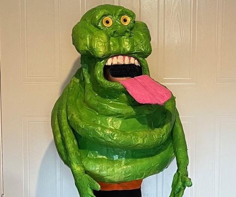 Homemade Slimer Costume: After watching the film with my six year old son I knew we had to attempt Slimer for Halloween. When making this costume I aimed to include some basic rules-  the costume should be light enough for him to wear comfortably, easy to take off quickly i… Slimer Costume Diy, Easy Ghostbusters Costume, Diy Slimer Ghostbusters Costume Adult, Slimer Costume, Classic Movie Monster Costume, Adult Costumes Diy, Green Spray Paint, Halloween Contest, Pink Posters