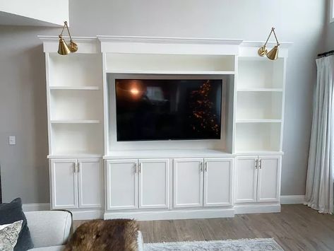 Ready to take on building an entertainment center for your family room? It’s not as difficult as you might think. So if you’re willing to invest the time and effort, you can create your own custom built-in for a fraction of what the professionals charge. Read on to find out how we designed and created this piece in just a week! This post contains affiliate links. Please see my full disclosure policy for more details.How much does it cost to build a built-in entertainment center?Init… Built In Media Center, Built In Tv Cabinet, Tv Stand Plans, Diy Built In, Entertainment Center Design, Built In Entertainment Center, Built In Shelves Living Room, Bathroom Vanity Makeover, Diy Entertainment