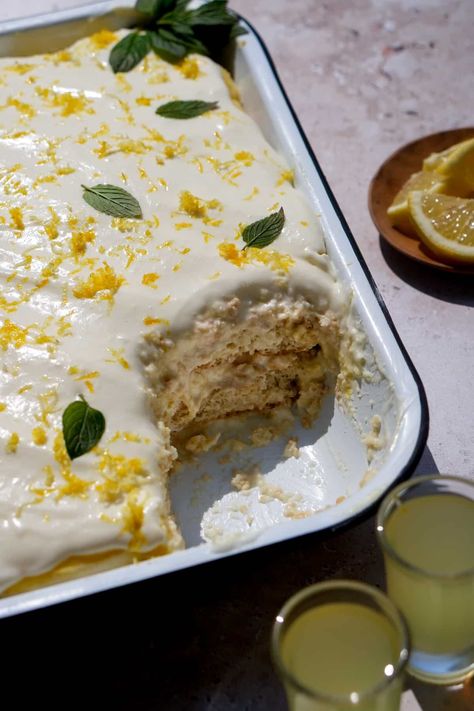 This limoncello tiramisu is made with ladyfingers, limoncello, mascarpone and lemon curd. A refreshing dessert for the lemon/limoncello lover! Limoncello Desserts Italian, Limoncello Tiramisu, Lemoncello Tiramisu Trifle, Traditional Tiramisu Recipe, Lemon Tiramisu Taste Of Home, Tiramisu Mascarpone, Lemoncello Tiramisu Limoncello, Limoncello Recipe, Italian Recipes Dessert