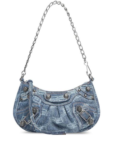 Le Cagole mini denim shoulder bag from BALENCIAGA featuring blue, bleached effect, cotton blend, silver-tone hardware, decorative buckle detail, detachable chain-link shoulder strap, detachable shoulder strap, top zip fastening, main compartment and BB monogram-pattern print. POSITIVELY CONSCIOUS: We've partnered with Good On You — an ethical agency that rates how sustainably brands perform across various people, planet and animal welfare criteria. This product comes from a Conscious brand that Bb Monogram, Denim Shoulder Bag, Blue Origin, Denim Shoulder Bags, Bleached Denim, Cross Bag, Designer Shoulder Bags, Mini Crossbody Bag, Mini Purse