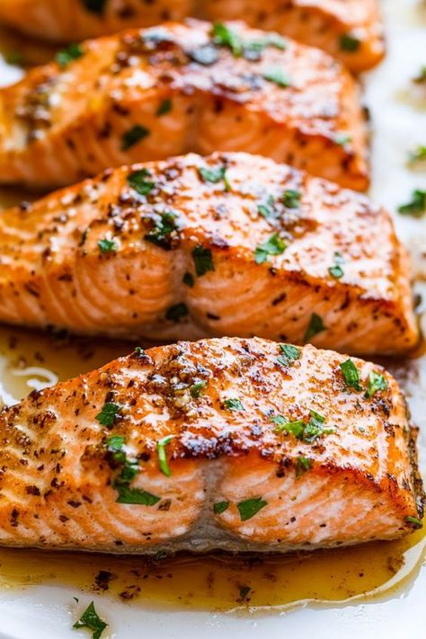 Discover a delicious twist on a classic favorite with our Honey Garlic Salmon recipe. Whether baked, cooked in an air fryer, or prepared in the oven, this dish is bursting with flavor. Try our easy-to-follow recipe for a savory and sweet meal that your whole family will love! Baked Salmon Recipes Oven, Oven Cooked Salmon, Healthy Baked Salmon Recipes, Cooked Salmon Recipes, Honey Baked Salmon, Salmon Recipes Baked Oven, Oven Baked Salmon Recipes, Salmon Recipes Oven, Oven Salmon