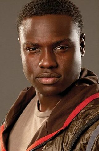 Thresh | The Hunger Games Wiki | Fandom Dayo Okeniyi, Hunger Games Tributes, Hunger Games Districts, Hunger Games Characters, Hunger Games Movies, Finnick Odair, Katniss And Peeta, Hunger Games 3, Hunger Games Series