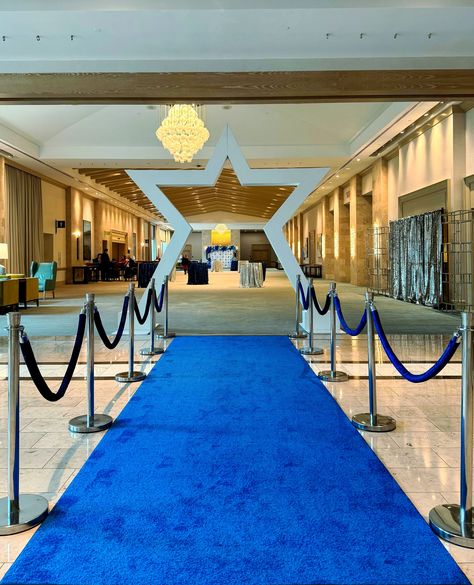 Step onto the blue carpet and into the limelight, where every path ends with a star! 🌠💙 #bluecarpet #runway #whitestar #giantstar #grandentrance #superstar #star #eventdecor #glamorous #glamdecor #starringevent #walktherunway #florida #orlando Blue Carpet Event, Blue Runway, Activation Ideas, Football Banquet, Gala Decorations, Banquet Ideas, Giant Star, Nightclub Design, Florida Orlando