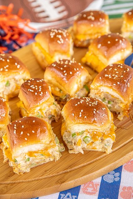 Hot Chicken Salad Sliders - my favorite chicken salad recipe and cheese sandwiched in Hawaiian rolls and topped with a sweet & savory glaze. Have mercy! Chicken, celery, Worcestershire sauce, mayonnaise, salt, pepper, Hawaiian rolls, butter, brown sugar, dijon mustard, and sesame seeds. Can assemble ahead of time and refrigerate until ready to bake. These easy baked chicken salad sandwiches that are great for parties, brunch, lunch, and dinner! #chickensalad #sandwich #sliders Baked Chicken Salad, Chicken Salad Sliders, Southwest Chicken Pasta, Hawaiian Chicken Salad, Hot Chicken Salad, Sandwich Sliders, Chicken Celery, Hot Chicken Salads, Chicken Salad Sandwiches