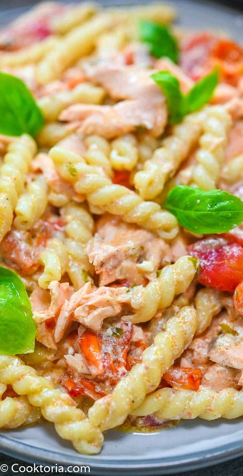 This Salmon Feta Pasta is so easy to make and is bursting with flavor. From the sweet cherry tomatoes to the baked feta, to the flaky salmon, this recipe is too delicious to miss. Healthy Korean Recipes, Salmon Noodles, Salmon Pasta Recipes, Grilled Portobello, Salmon Spinach, Smoked Salmon Recipes, Cherry Tomato Pasta, Baked Feta, Salmon Pasta