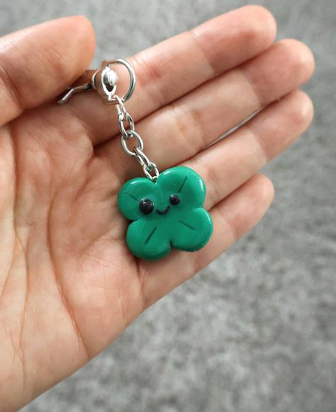 This is a cute lucky clover lucky charm keychain that wants to go everywhere with you! Clover Keychain, Clay Keychain, Bao Bao, Keychain Handmade, Clover Charm, Clay Art Projects, Charm Keychain, Clay Necklace, Lucky Clover