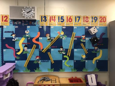 Life Size Chutes And Ladders, Chutes And Ladders Bulletin Board, Board Game Decorations Classroom, Board Game Classroom Door Decorations, Chutes And Ladders Decorations, Board Game Hallway Theme, Game Theme Door Decorations, Vbs Twist And Turns, Game Theme Bulletin Board Ideas