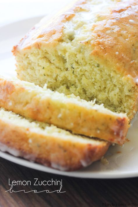 This Lemon Zucchini Bread is a delicious combo of the classic zucchini bread and lemon bread. Together with the lemon glaze, this quick bread will have everyone wanting the recipe. Lemon Zucchini Bread, Bread Healthy, Resipi Kek, Lemon Zucchini, Lemon Bread, Zucchini Bread Recipes, Lemon Glaze, Quick Bread Recipes, Zucchini Bread