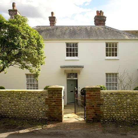 This Grade II‎-listed Georgian farmhouse in West Sussex features a hallway, sitting room, dining room, kitchen, drawing room, family room, utility room, boot room, five bedrooms and three bathrooms. Farmhouse Cottage Exterior, Georgian Farmhouse, Farmhouse Exterior Colors, White Farmhouse Exterior, 25 Beautiful Homes, Exterior House Siding, Cottage Front Doors, Cottage Exterior, Exterior Paint Colors For House