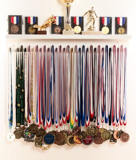 Hanging Medals, Sports Medal Display, Gymnastics Medals, Trophy Display, Ribbon Display, Ribbon Organization, Medal Ribbon, Award Display, White Wood Wall