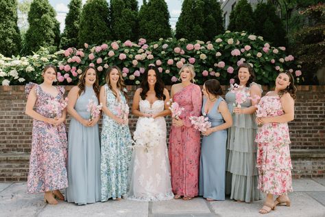 floral garden party vibes with mixed match bridesmaid dresses Mixed Bridesmaid Dresses Spring, Mixed Floral Bridesmaid Dresses, Mix And Match Bridesmaid Dresses Pink And Blue, Bridesmaids Mixmatch, Mix And Match Bridesmaid Dresses Blue Floral Prints, Mix Match Bridesmaid Dresses, Mix And Match Bridesmaid Dresses, Champagne Bridesmaid Dresses With Bright Florals, Floral Bridesmaid Dresses Mismatched