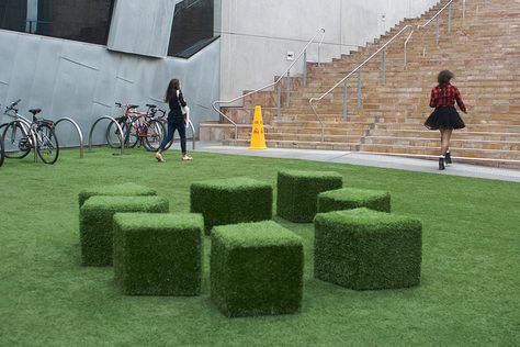 Why not? Any place like a campus, business park deserves a modern look with a touch of earthy tones. Fake Grass Ideas, Artificial Grass Display Showroom, Grass Mound Seating, Fake Grass Play Area For Kids, Fake Grass Installation, Fake Grass Dog Area, Fake Grass, Artificial Lawn, Synthetic Turf