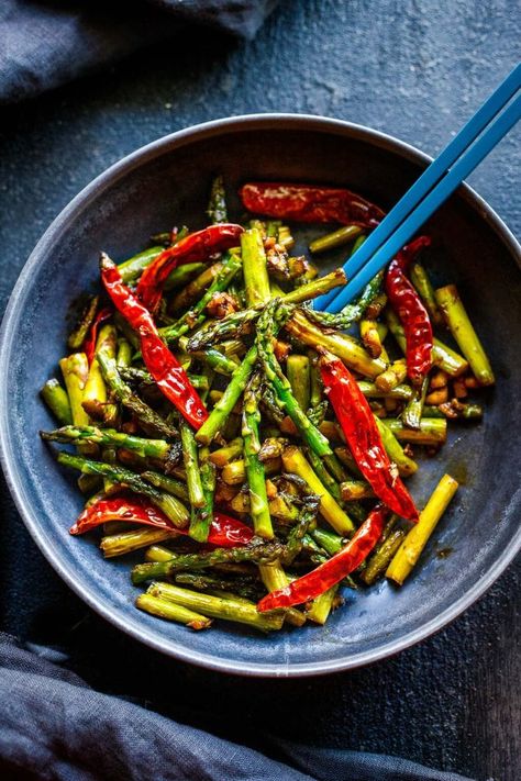 Stir-Fried Asparagus with garlic, ginger, dried chilies and Szechuan sauce - a fast, easy vegan side dish that will spice up your dinner. Serve it with rice and crispy tofu (or chicken), and it becomes a quick and flavorful meal. Fried Asparagus, Szechuan Sauce, Asparagus Fries, Chinese Cooking Wine, Black Bean Sauce, Vegan Side Dishes, Vegan Clean, Vegan Sides, Crispy Tofu