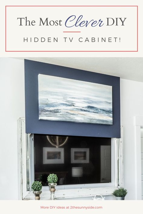 Cleaver DIY hidden TV cabinet uses drawer slides to raise and lower artwork. Beautiful and  Functional! See it in action on the website. (5 second video) #coastal #coastalhomedecor #Coastalfurnishings #hiddentv #hiddentvcabinet #tvdisguise #tvhide #tvhiding #diyinspiration #diylove #diydecor #diytips #buildsomething #easydiy #diyideas #diys #doityourself #doityourselfproject #homediy #diyprojects #diyhomedecor Diy Hidden Tv, Hide A Tv, Hidden Tv Cabinet, Hide Tv, Farmhouse Craftsman, Family Halloween Party, Monochrome Decor, Hidden Tv, Upcycle Decor