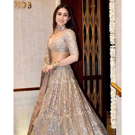 Sara Ali Khan on Instagram: "Diwali nights 🎊🎊🎊 It’s the festival of lights 🪔🪔🪔 Forget all the pettiness and fights 💝💝 Just enjoy mithai and sweet bites 🍡🍡🍡 @manishmalhotra05 @yogenshah_s" Heavy Lehenga, Gold Organza, Simple Lehenga, Reception Outfit, Trendy Outfits Indian, Sweet Bites, Heavy Dresses, Wedding Lehenga Designs, Lehenga Designs Simple