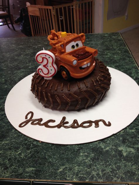 Donut Tire Cake, Mater Cake Ideas, Tow Mater Birthday Cake, Tire Smash Cake, Mater Birthday Cake, Tire Birthday Cake, Homemade Chocolate Icing, Semi Truck Cakes, Mater Cake