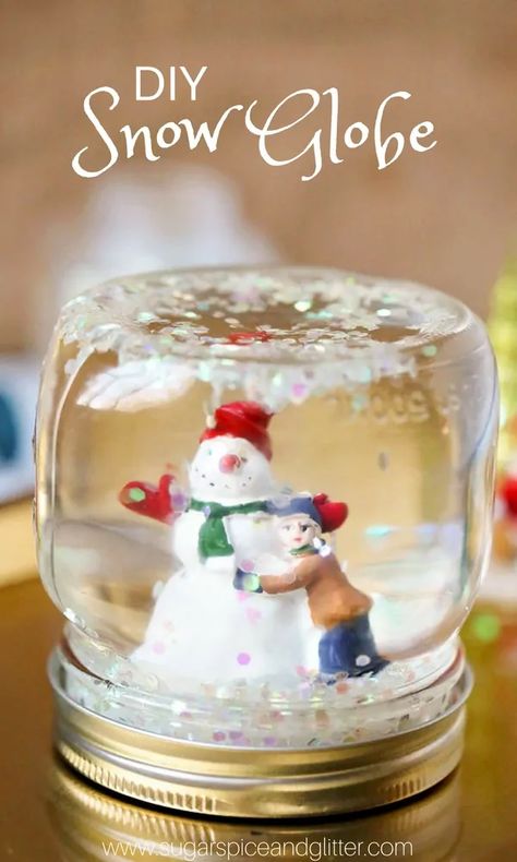 Snow Globes Diy, Snow Globe For Kids, Christmas Snow Globes Diy, Diy Snow Globes, Homemade Snow Globes, Homemade Snow, Easy Mason Jar Crafts, Holiday Snow Globe, Globe Diy