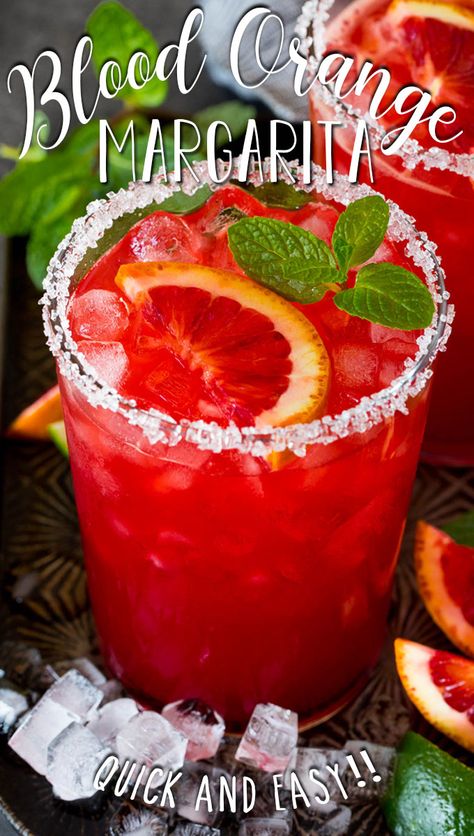 This blood orange margarita recipe is a combination of freshly squeezed orange juice, tequila, triple sec, lime juice and grenadine. Orange Margarita Recipe, Blood Orange Margarita Recipe, Holiday Martinis, Martini Recipes Vodka, Orange Margarita, Easy Margarita Recipe, Blood Orange Margarita, Squeezed Orange Juice, Best Cocktail Recipes