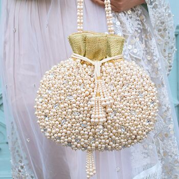 Cream Jute Stone Embellished Potli Bag By Atiya Choudhury | notonthehighstreet.com Potli Bag, Wedding Handbag, Pumpkin Patch Outfit, Designer Pieces, Potli Bags, Pearl Bag, Handcrafted Bags, Satin Silk, Beaded Bags