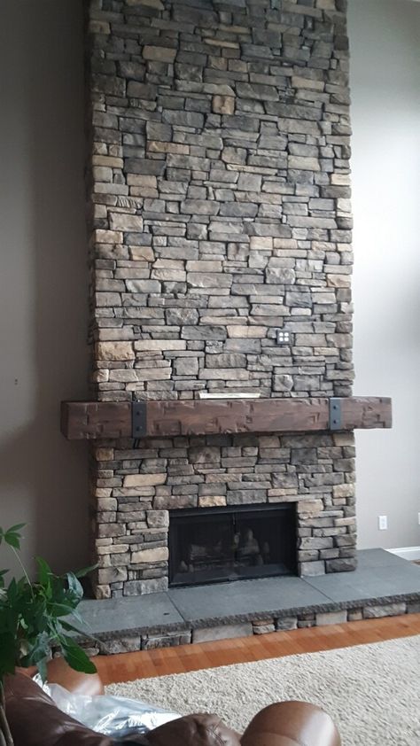 Stone fireplace remodel for an elegant look Stone Fireplace Modern Farmhouse, Small Stone Fireplace Ideas, Stone Veneer Fireplace Farmhouse, Stone Fireplace High Ceiling, Slate Stone Fireplace, Dry Stacked Stone Fireplace, Stone Fireplace Surround Ideas, Versetta Stone Fireplace, Stone Fireplace Wood Mantle