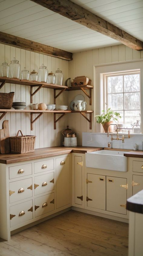 Add a vintage touch to your small cottage kitchen with cottage kitchen shelves and timeless accessories. From wooden shelves to colorful ceramics, thi... Cottage Open Shelving Kitchen, Tiny Cottage Kitchen Ideas, Cottagecore Kitchen Aesthetic, Cottage Cabinets, Cottage Shelves, Small Cottage Kitchen Ideas, Cottage Kitchen Shelves, Rustic Cottage Kitchens, Tiny Cottage Kitchen