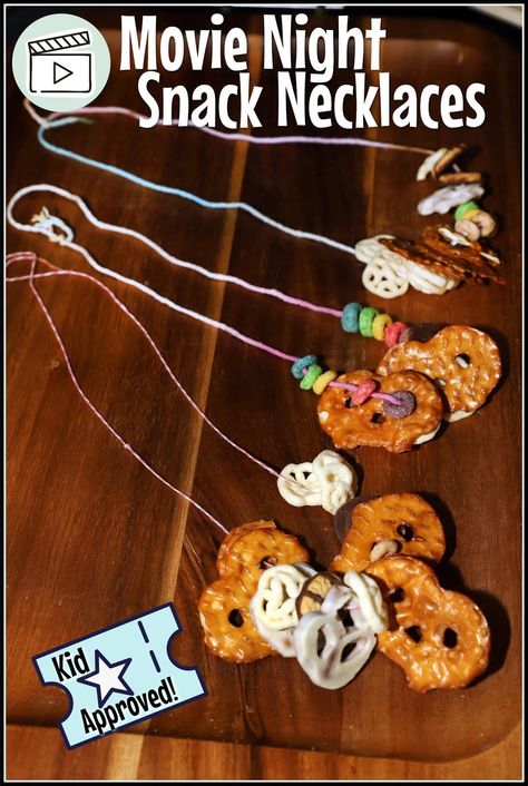 My kids and I made these fun Movie Night Snack Necklaces for our movie nights, both at home and at the theater. They are easy to make with any snack that you can string on and were a tasty treat during the show! Great for slumber parties too. Snack Necklace, Chewy Granola Bars Homemade, Homemade Cheese Crackers, Movie Night Snacks, Sweet Potato And Apple, Movie Snacks, Road Trip Snacks, Mini Pretzels, Fun School