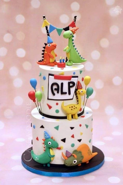 Dinosaur Two Tier Cake, 2 Tier Dinosaur Cake, Dino Birthday Cake, Tiered Cakes Birthday, Dinosaur Birthday Party Decorations, Dino Cake, Dinosaur Birthday Cakes, Boys 1st Birthday Party Ideas, Dinosaur Themed Birthday Party