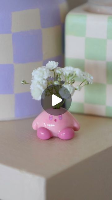 𝕛𝕦𝕝𝕖𝕤 (´｡• ω •｡`) 𓋼𓍊 on Instagram: "SOLD OUT: will restock at a future date 🤍**PREORDER LINK IN MY STORIES! Etsy shop link in my bio!*** 🤍

just a chonky little kirby flower holder for your viewing pleasure!!
made these the other night to celebrate being finished with all my other projects! now i can focus solely on my small business, so stay tuned for all the new tiny friends i’m gonna make (-‘: 🤍
.
.
.
.
.
.
.
.
#kirby #polymerclay #clay #polymerclaycreations #resin #acrylicpaint #gaming #flowers #flowerpot #driedflowers #cute #pink #cozy #bright #motivationalquotes #gaming #videogames #gamer #kirbyfanart #kirby" Kirby Core, Kirby Clay, Clay Kirby, Kirby Art, Clay Vase, Flower Holder, Ceramics Pottery Art, Polymer Clay Creations, Clay Projects