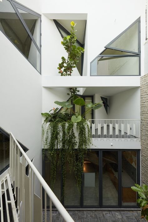 Gallery of House of Triangles / Khuon Studio - 18 Triangle Balcony, Triangle Door, Studio Plan, Triangle Window, Shigeru Ban, Compact House, Studio Photo, Window Frame, Windows And Doors