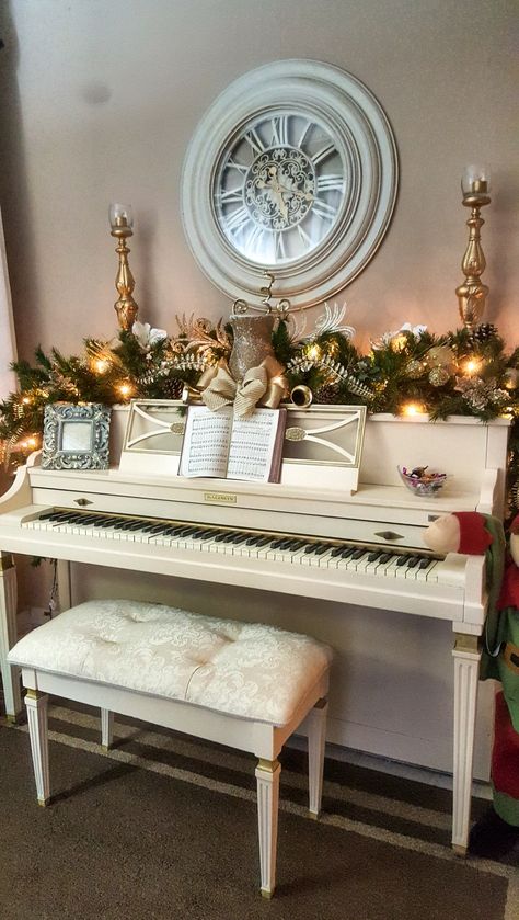 Ivory Piano Christmas Decor Christmas Decor For Piano Top, Christmas Piano Decorating Ideas, Decorating A Piano For Christmas, White Piano Decor, Piano Christmas Decor Ideas, Christmas Decorations On Piano, Top Of Piano Christmas Decor, Decor Above Piano, Piano Top Christmas Decor