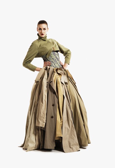 § The ultimate recycler. Gary Harvey transforms 18 trench coats, a Burberry dress and cropped Mac into something magical. Creative Dresses, Trash Fashion, Reuse Clothes, Raincoat Outfit, Rain Coats, Trench Coat Dress, Recycled Clothing, Gaun Fashion, La Fashion Week