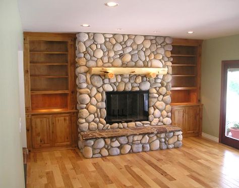 Working with the river rock... paint the built-in's grey? Love this with the book shelves!!! Riverstone Fireplace, River Rock Fireplace, Insulation Ideas, Stone Fireplace Decor, Morning Kitchen, Basement Insulation, Cozy Basement Ideas, River Rock Fireplaces, Cozy Family Room