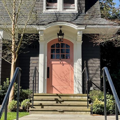 Drove by this house today and had to take a quick photo! The front door is so charming... the color, the arch, the windows... I also just love the fact that the homeowners selected a salmon paint color. I can’t imagine this door any other color! . . . #ThePhinery #PhineryStyle #FindItStyleIT #SMMakeLifeBeatufiul #SODomino #CurrentDesignSituation #ApartmentTherapy #MyDomaine #LonnyLiving #RueDaily #HomewithRue #MakeTimeForDesign #VogueLiving #ElleDecor #HomeStyle #HomeDecor #InteriorDesign #I... Salmon Front Door, Salmon Paint Color, Fall Paint Colors, Blush Wallpaper, Seattle Homes, Exterior Paint Color, Navy Wallpaper, Kitchen And Bath Design, Forest Wallpaper