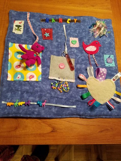 Fiddle mat I created for my mother. Fiddle Mats, Fidget Boards, Chemo Port Pillow, Port Pillow, Chemo Port, Fidget Quilts, Sensory Blanket, Fidget Blankets, Fidget Quilt