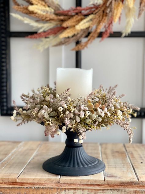 Fall Pumpkin Berry Candle Ring white berries with weathered flocked Eucalyptus/boxwood greenery candle ring,12 in tip to tip/ 6in center for candle,full candle ring, pillar candle ring, fall home decor tabletop This neutral candle ring is a charming mixture of cool toned weathered/flock foliage and lavender-like spires with small, white pumpkin like berries and berry-like orbs. This Candle Ring measures 12 inches on the outer tip to tip,6 inches on the inner for the candle pillar. This fall pump High End Fall Decor, Muted Fall Decor, Fall Candlesticks, Neutral Candles, Fall Candle Rings, Burgundy Decor, Christmas Candle Rings, Berry Candle, Fall Candle Holders